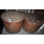 A NEAR-PAIR OF LIDDED WOODEN STORAGE BOXES OF CYLINDRICAL FORM