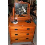 AN EARLY 20TH CENTURY MIRROR-BACK CHEST OF THREE DRAWERS