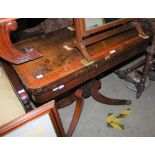 A 19TH CENTURY ROSEWOOD PEDESTAL CARD / GAMES TABLE ON FOUR DOWNSWEPT SUPPORTS WITH BRASS PAW FEET