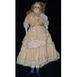 A LATE 19TH / EARLY 20TH CENTURY BISQUE HEAD PORCELAIN DOLL, WITH PORCELAIN FORE ARMS AND LOWER