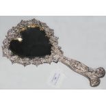 A WHITE METAL DRESSING TABLE MIRROR WITH HEART SHAPED LOOKING GLASS