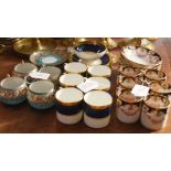 A CROWN STAFFORDSHIRE SIX PIECE COFFEE SET, A COALPORT ATHLONE BLUE SIX PIECE COFFEE SET, AND FOUR