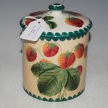 A WEMYSS POTTERY BISCUIT BARREL AND COVER DECORATED WITH STRAWBERRIES, IMPRESSED WEMYSS AND GREEN