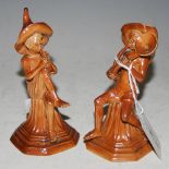 GEORGE TINWORTH FOR DOULTON LAMBETH - TWO STONEWARE MUSICAL FIGURES, ONE PLAYING HORN, THE OTHER
