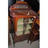 AN EDWARDIAN MAHOGANY AND BOXWOOD LINED SIDE CABINET WITH GLAZED CUPBOARD DOOR OPENING TO A