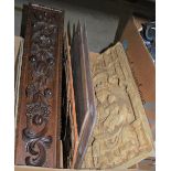 BOX CONTAINING FOUR ASSORTED CARVED WOOD PANELS, AND A CERAMIC PANEL OF MOTHER AND CHILD