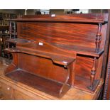 A MAHOGANY THREE-TIER HANGING SHELF, AND ANOTHER MAHOGANY AND EBONY LINED TWO-TIER HANGING SHELF