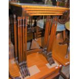 A NEST OF FOUR REPRODUCTION MAHOGANY, BOXWOOD AND EBONY LINED RECTANGULAR OCCASIONAL TABLES