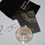 A SOUTH AFRICAN MINT 2017 1OZ FINE SILVER KRUGERRAND WITH CERTIFICATE OF AUTHENTICITY