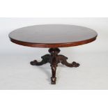 A VICTORIAN MAHOGANY CENTRE TABLE, THE OVAL SHAPED TOP RAISED ON A TURNED CYLINDRICAL SUPPORT ON