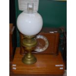A BRASS PARAFFIN LAMP, A VINTAGE MANTLE CLOCK WITH PRESENTATION INSCRIPTION TOGETHER WITH A CASED