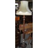 AN EARLY 20TH CENTURY STANDARD LAMP AND SHADE