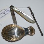 A BIRMINGHAM SILVER CADDY SPOON WITH SHELL SHAPED HANDLE, A WHITE METAL SWIZZLE STICK INSCRIBED '