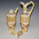 A PAIR OF ZSOLNAY PECS RETICULATED POTTERY EWERS, ONE WITH DAMAGES