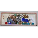 A BOX OF ASSORTED COSTUME JEWELLERY, EARRINGS AND A PAIR OF BLUE ART DECO STYLE CLIPS