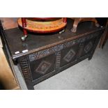 A LATE 19TH / EARLY 20TH CENTURY STAINED OAK COFFER WITH TRIPLE PANEL FRONT