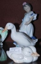 THREE CERAMIC FIGURES TO INCLUDE A ROYAL COPENHAGEN FIGURE OF TWO GEESE, A DANISH FIGURE OF A SINGLE