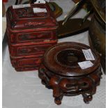 A CHINESE RED CINNABAR LACQUER THREE SECTIONAL STORAGE BOX AND COVER, TOGETHER WITH A CHINESE CARVED