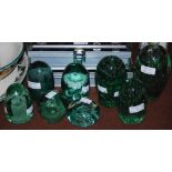 EIGHT ASSORTED GREEN GLASS PAPERWEIGHTS