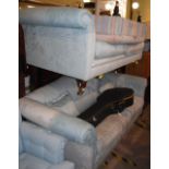 A NEAR-PAIR OF PALE BLUE FLORAL UPHOLSTERED TWO-SEAT SOFAS, PROBABLY LAURA ASHLEY