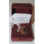 A 9CT GOLD AND GARNET CLUSTER RING, GROSS WEIGHT 4.4 GRAMS