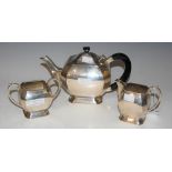 A THREE PIECE WHITE METAL ART DECO STYLE TEA SET, STAMPED 'SILVER', GROSS WEIGHT 41 TROY OZS