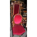 A WALNUT HALL CHAIR WITH RED VELVET UPHOLSTERY AND CARVED TOP RAIL WITH CROWN DETAIL, TOGETHER