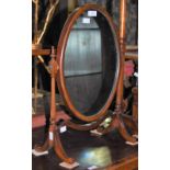 A MAHOGANY DRESSING TABLE MIRROR WITH OVAL MIRROR PLATE