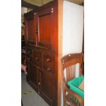 A VICTORIAN PINE TWO PART CUPBOARD, THE UPPER SECTION FITTED WITH PAIR OF CUPBOARD DOORS, ON A