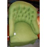 A LATE 19TH/ EARLY 20TH CENTURY BUTTON-DOWN ARMCHAIR IN GREEN UPHOLSTERY