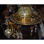 A COLLECTION OF MIDDLE-EASTERN BRASS WARE TO INCLUDE A MOTHER OF PEARL INLAID FOLDING TABLE WITH