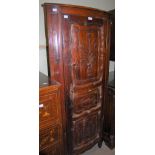 A FRENCH PROVINCIAL CORNER CUPBOARD