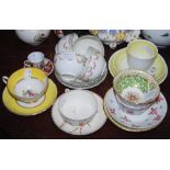 A COLLECTION OF ASSORTED TEACUPS AND SAUCERS