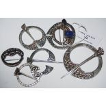 COLLECTION OF SEVEN ASSORTED SILVER AND WHITE METAL CELTIC STYLE PLAID BROOCHES, SOME IN THE