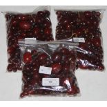 THREE BAGS OF ASSORTED RED AMBER TYPE LOOSE AND PART STRUNG BEADS