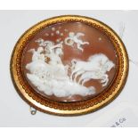 A LATE 19TH CENTURY YELLOW METAL MOUNTED CAMEO BROOCH CARVED WITH PAIR OF HORSES PULLING A
