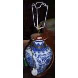 A DECORATIVE CHINESE PORCELAIN BLUE AND WHITE TABLE LAMP AND SHADE
