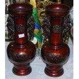 A PAIR OF JAPANESE BRONZED TWIN-HANDLED BOTTLE VASES