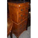A REPRODUCTION YEW WOOD CHEST ON CHEST, FITTED WITH SIX DRAWERS