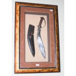 THREE FRAMED MIDDLE-EASTERN WEAPONS COMPRISING KUKRI KNIFE AND LEATHER SCABBARD, DAGGER AND SHEATH