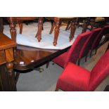 A REPRODUCTION MAHOGANY TRIPLE PEDESTAL DINING TABLE, COMPRISING TWO D-ENDS AND RECTANGULAR CENTRE