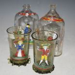 GROUP OF GLASSWARE TO INCLUDE TWO GREEN POLYCHROME DECORATED BEAKER CUPS WITH PINCHED DETAIL, AND
