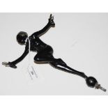 LORENZELL - A BLACK PAINTED AND SILVERED METAL FIGURE OF A DANCER