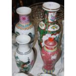 A 20TH CENTURY CHINESE PORCELAIN FAMIILE ROSE VASE ON PIERCED AND CARVED WOOD STAND, TOGETHER WITH