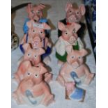 SEVEN ASSORTED WADE PIGGY BANKS, AND A WADE FIGURE OF A SLEEPING PIGLET