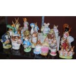 A GROUP OF TWENTY-THREE BESWICK BEATRIX POTTER FIGURES TO INCLUDE "PICKLES", "SQUIRREL NUTKIN", "