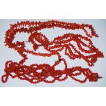 FOUR ASSORTED RED CORAL NECKLACES