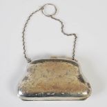 A George V silver purse, Chester, 1917, makers mark T&S, with engraved scroll decoration and brown