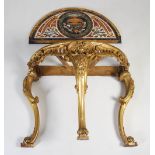An Italian pietra dura and gilt wood demilune console table, the pietra dura top inlaid with various