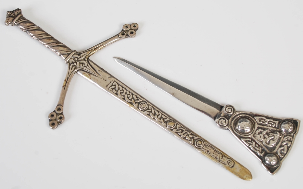 Alexander Ritchie, a white metal paper knife/ letter opener in the form of a sword, inscribed to one